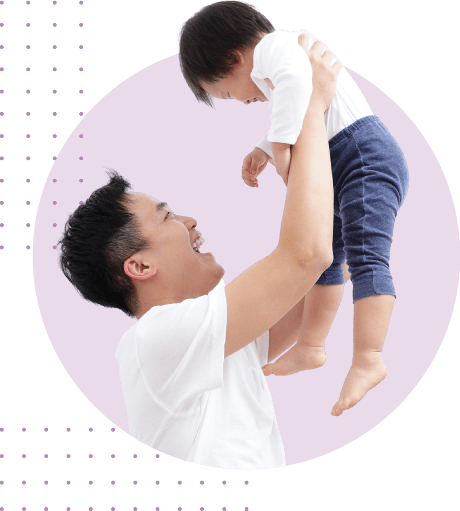 father holding his child up in the air